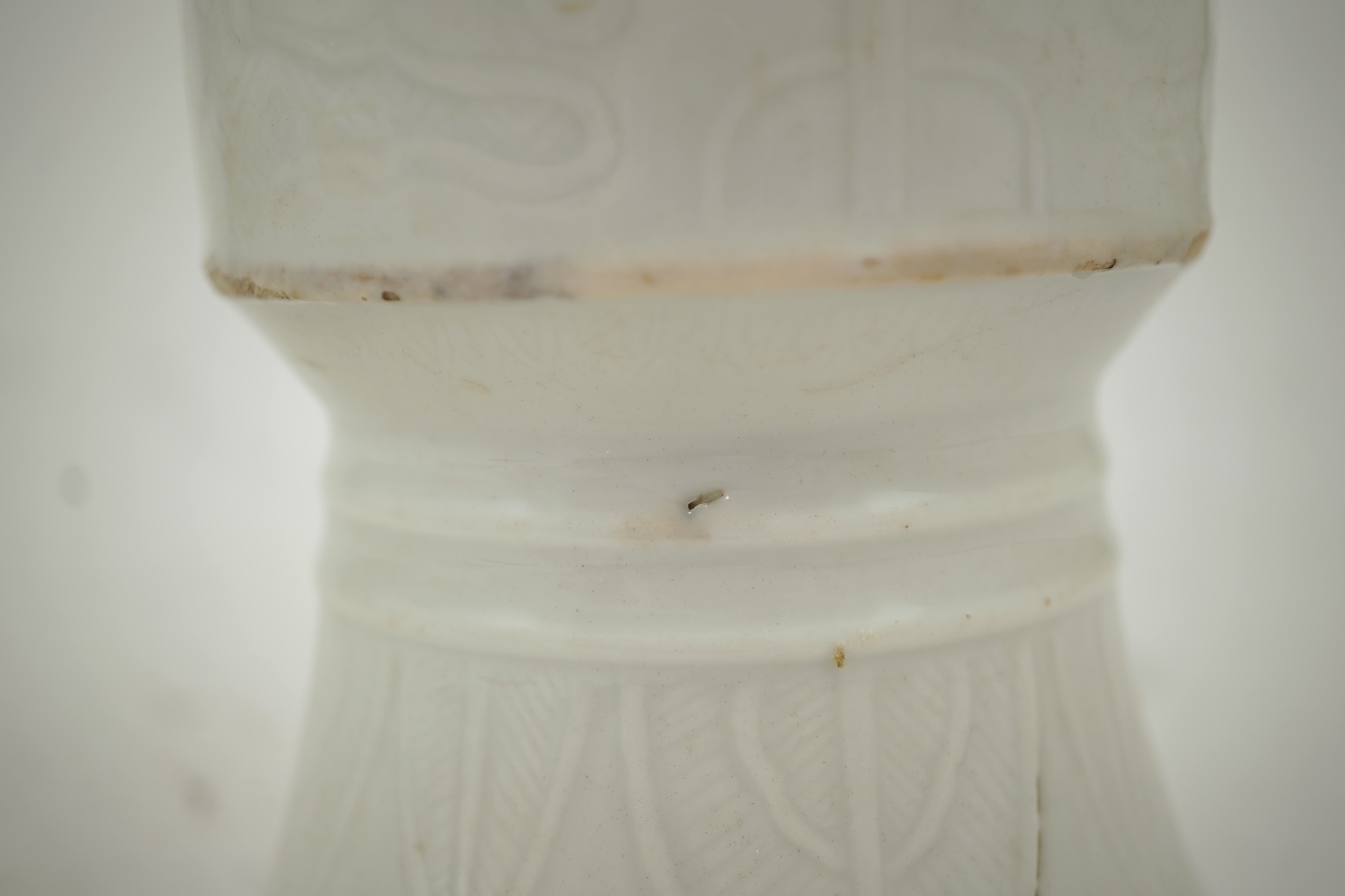 A Chinese white glazed 'gu' vase, 19th century